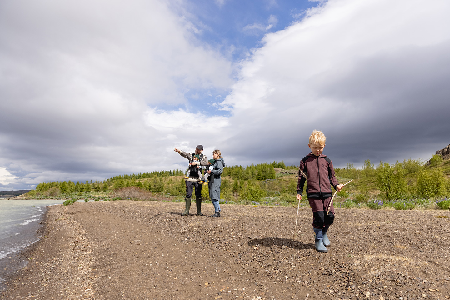 Family enjoying the view by lake Lagarfljót