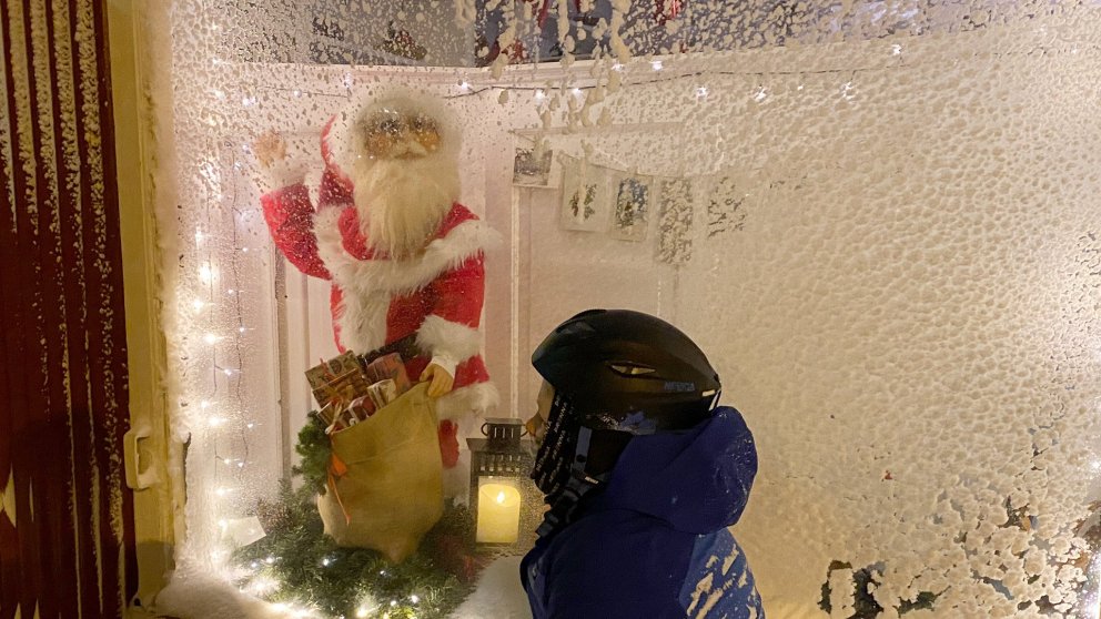 The kids know Christmas is around the corner when Santa arrives in the window at Hotel Aldan in Seyð…